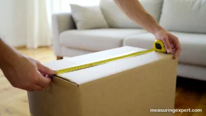 Measuring width and length of a shipping box with a tape measure